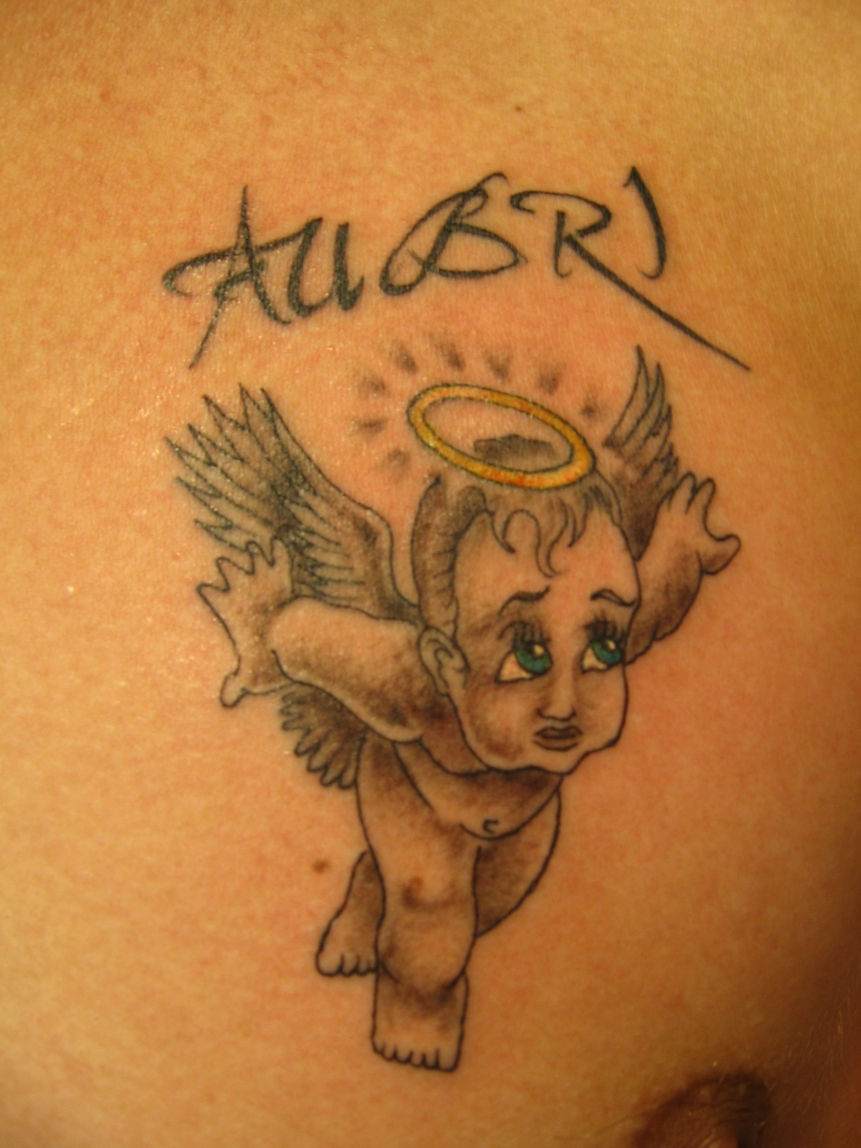 baby angel tattoo design12 - 100's of Angel and Devil Tattoo Design Ideas Pictures Gallery