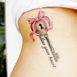 Female Tattoo 1 150x150 - 100's of Female Tattoo Design Ideas Pictures Gallery