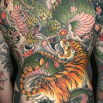 Tiger and Dragon 1 150x150 - 100's of Tiger and Dragon Tattoo Design Ideas Pictures Gallery