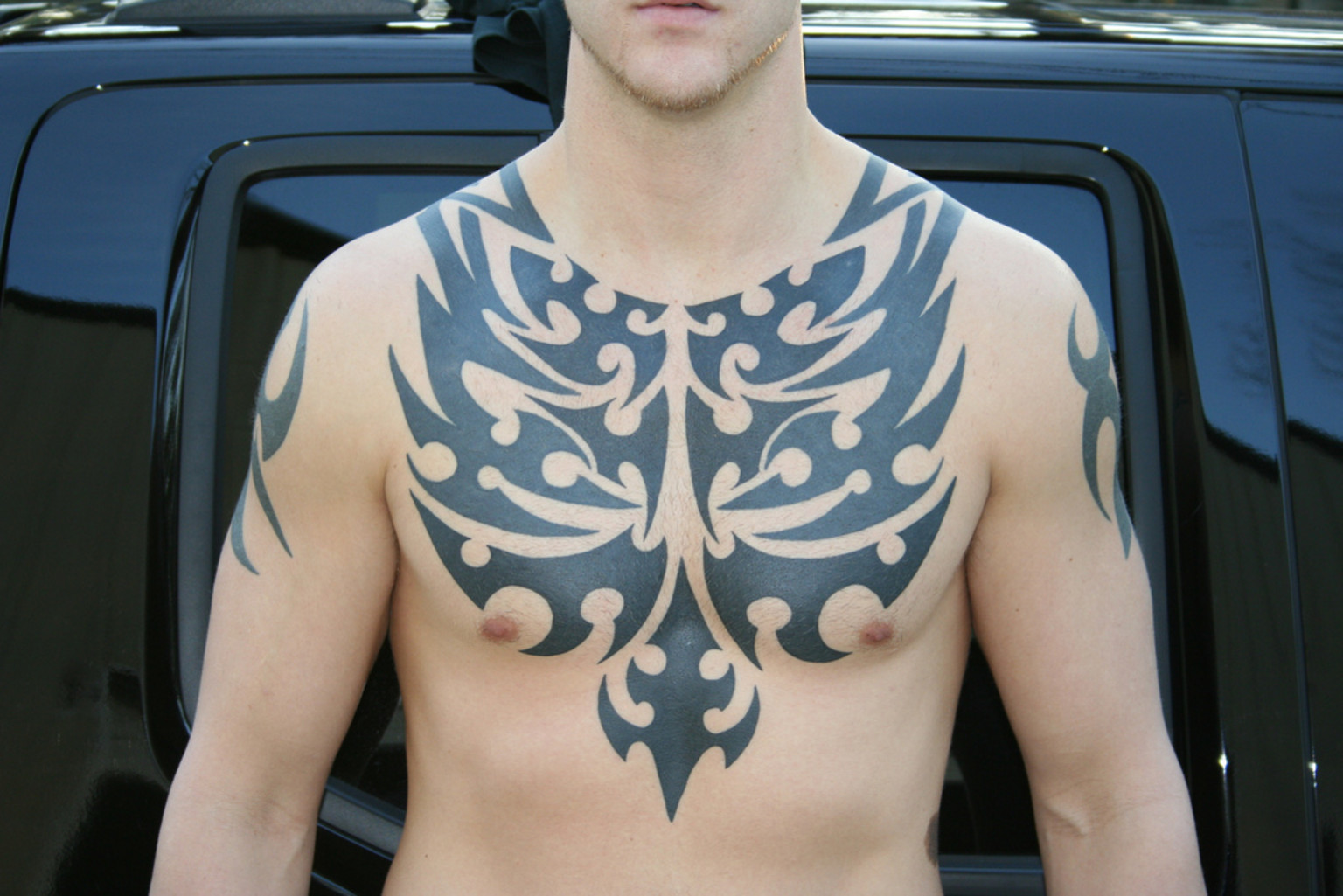 Tribal Chest Tattoo6 - 100's of Boys Tattoo Design Ideas Picture Gallery