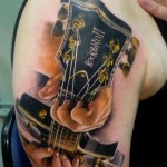 Guitar Tattoos 1 150x150 - Guitar Tattoos Design Ideas Pictures Gallery