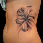 lilly tattoos 2 150x150 - Lilly Tattoos Design Ideas Pictures Gallery