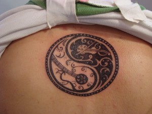 yin yang tattoos2 300x225 - Yin Yang Tattoos Design Ideas Pictures Gallery