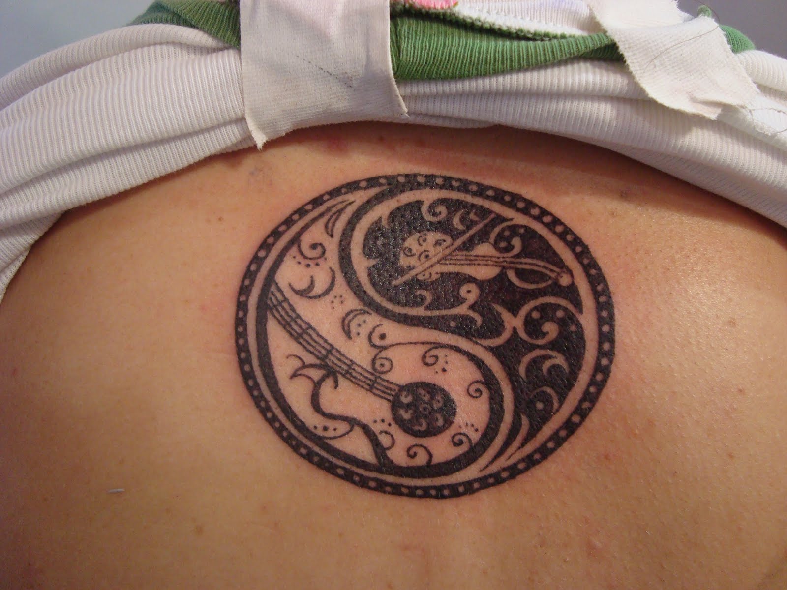 yin yang tattoos2 - Anime Tattoos Design Ideas Pictures Gallery