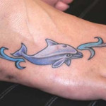 Dolphin Tattoos 15 150x150 - 100's of Dolphin Tattoo Design Ideas Picture Gallery