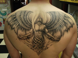 Men Tattoos 3 300x225 - 100's of Back Tattoo Design Ideas Picture Gallery