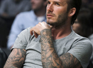 david beckham sleeve tattoo 300x220 - 100's of David Beckham Tattoo Design Ideas Picture Gallery