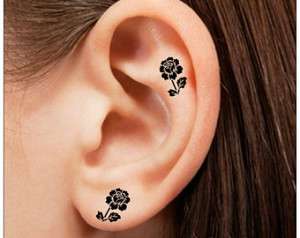 ear tattoos 13 300x238 - 100's of Ear Tattoo Design Ideas Picture Gallery