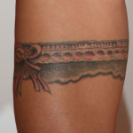 katie price garter tattoo 150x150 - 100's of Kattie Pricea Tattoo Design Ideas Picture Gallery.
