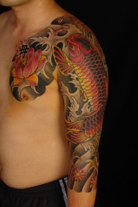 lotus flower and koi japanese tattoo on chest and sleeve for men 200x300 - lotus-flower-and-koi-japanese-tattoo-on-chest-and-sleeve-for-men